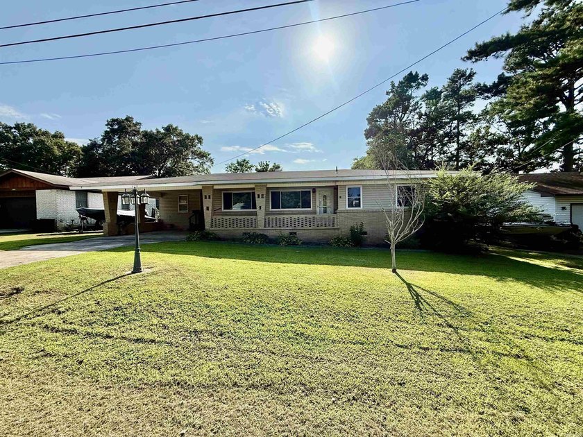 Welcome home to this charming 3-bedroom 2-bath home in a - photo 24
