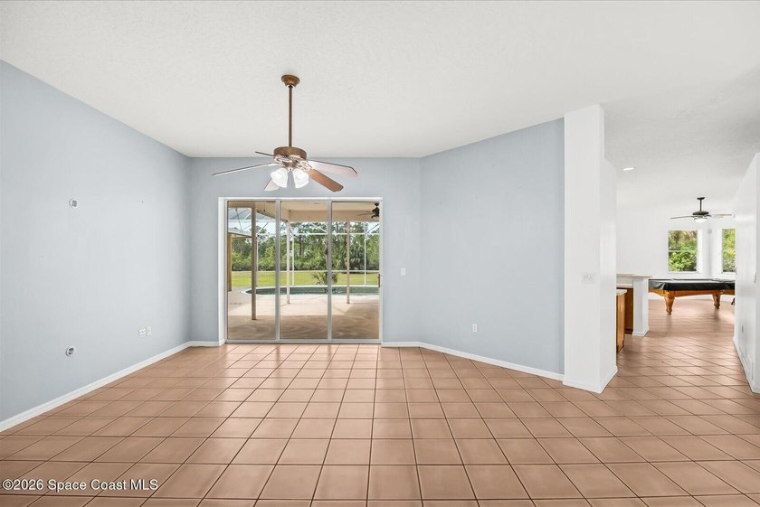 Rare 9.43-acre pool home in Grant! this property blends - photo 9