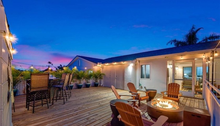 Perfectly positioned within the exclusive waterfront enclave of - photo 11