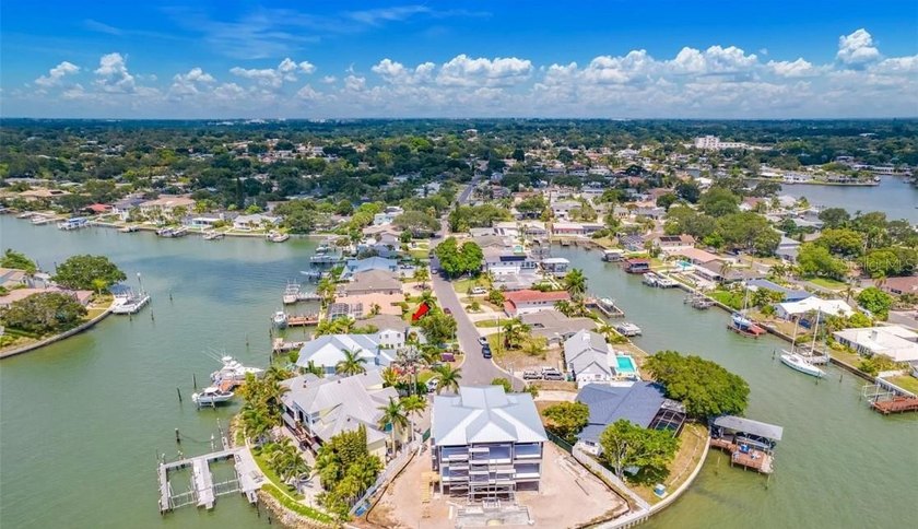Perfectly positioned within the exclusive waterfront enclave of - photo 20