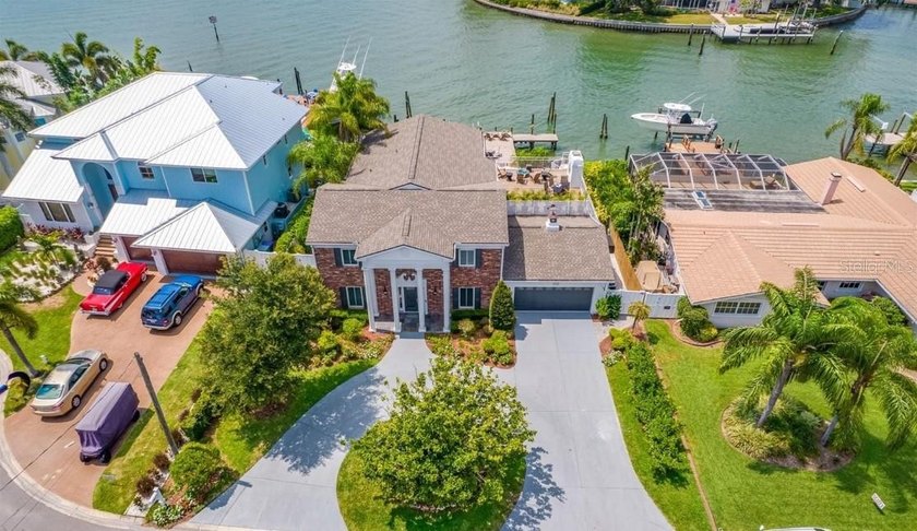 Perfectly positioned within the exclusive waterfront enclave of - photo 21