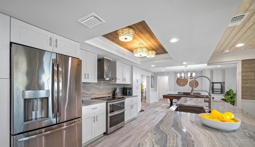 Perfectly positioned within the exclusive waterfront enclave of - photo 49