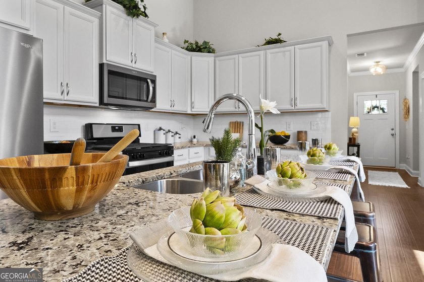 Welcome to Lakeside Garden, a truly one-of-a-kind townhome in - photo 13