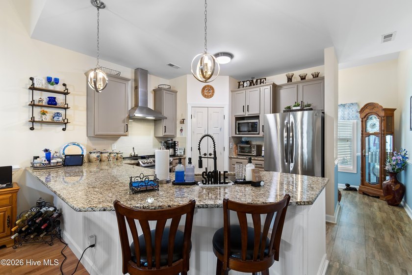 This extremely well-kept and updated townhouse in the - photo 12