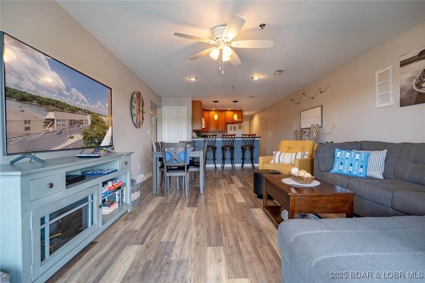 Welcome to this beautifully remodeled, walk-in end unit at The - photo 2