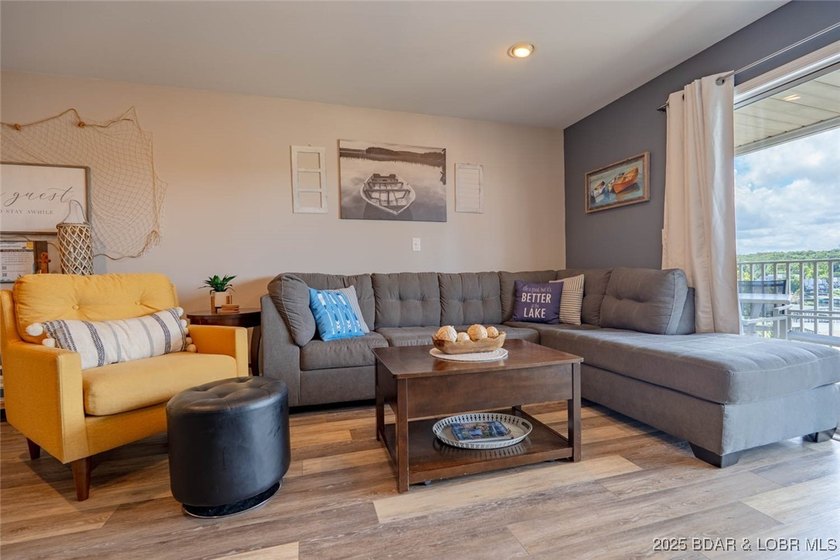 Welcome to this beautifully remodeled, walk-in end unit at The - photo 4