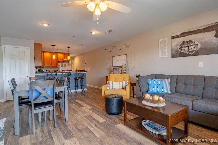 Welcome to this beautifully remodeled, walk-in end unit at The - photo 6
