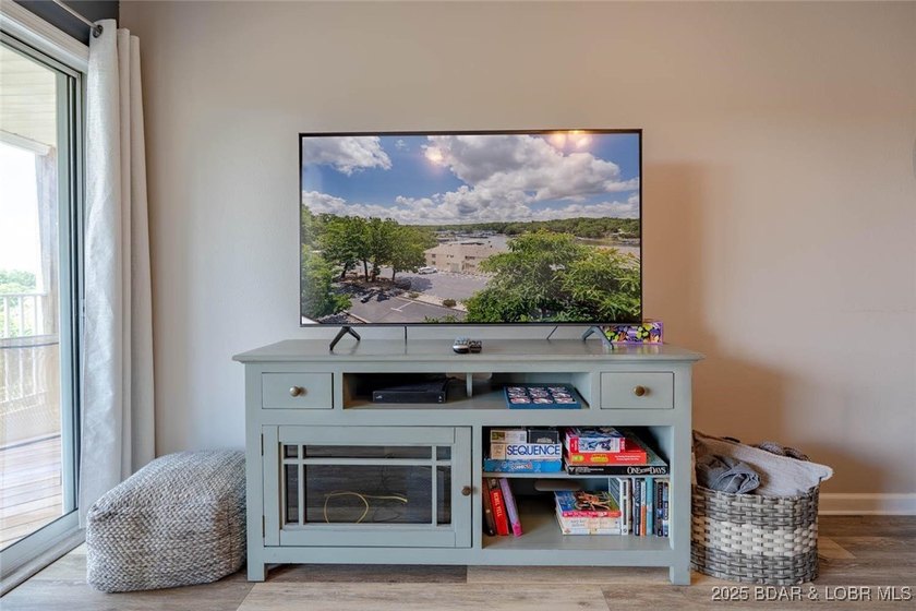 Welcome to this beautifully remodeled, walk-in end unit at The - photo 7