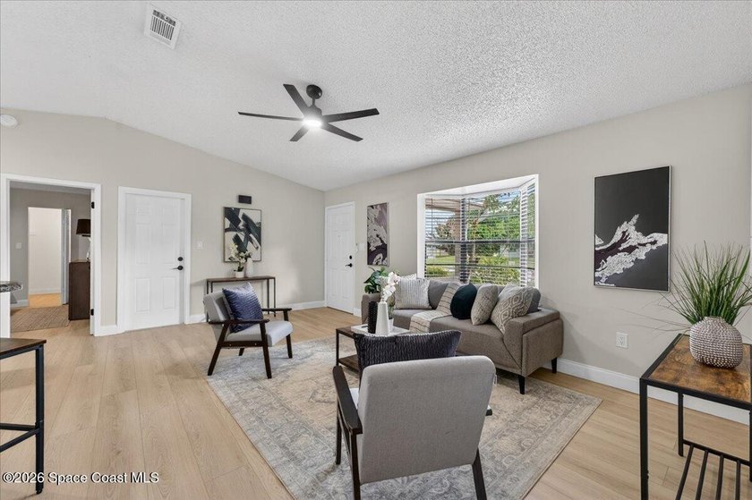 Welcome home to this charming 3-bedroom, 2-bath residence with a - photo 5