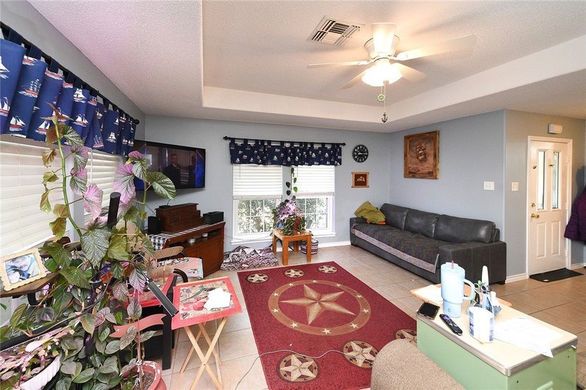 Check out the VIRTUAL WALK-THROUGH. This well-maintained - photo 4