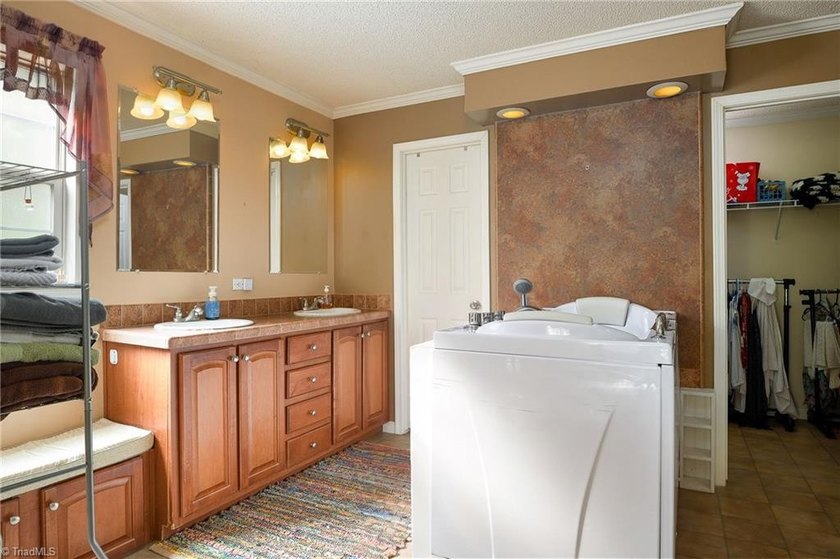 Tucked away on 1.17+/- acres, this property offers the perfect - photo 15