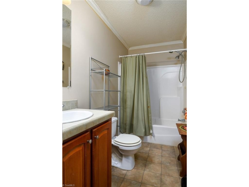 Tucked away on 1.17+/- acres, this property offers the perfect - photo 19