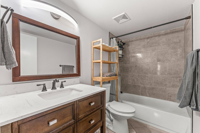 Beautifully renovated 2nd-floor corner unit in the highly - photo 22
