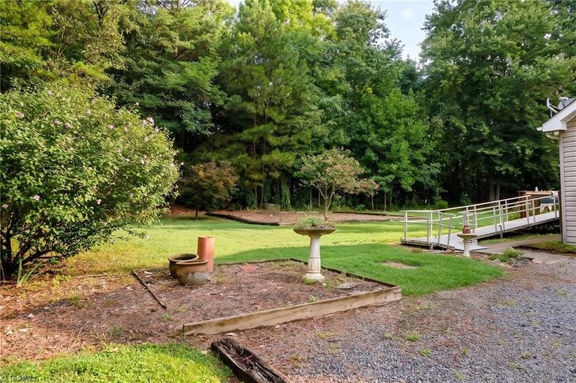 Tucked away on 1.17+/- acres, this property offers the perfect - photo 25