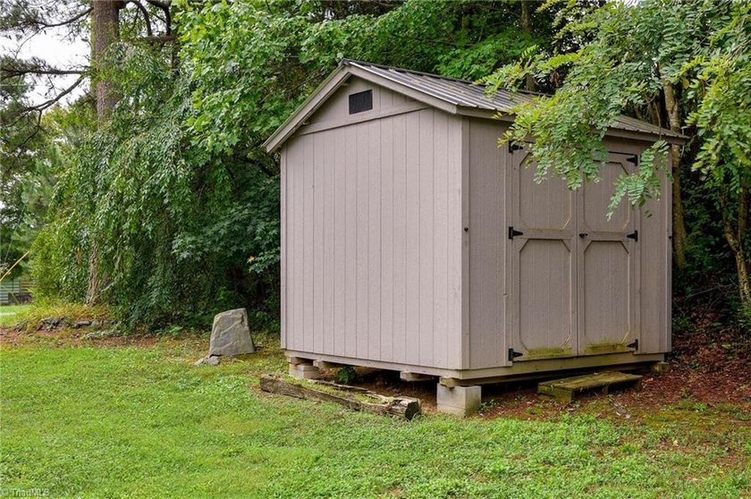 Tucked away on 1.17+/- acres, this property offers the perfect - photo 29
