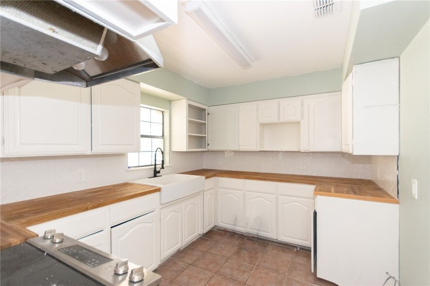 Welcome to this stunningly remodeled gem that effortlessly - photo 3