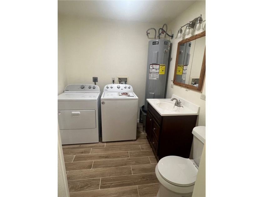 Situated on 5 acres across from the South Shore entrance of - photo 5