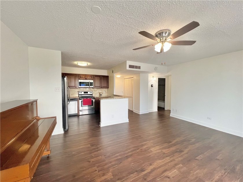 Enjoy coastal living at its best in this bright and inviting - photo 9