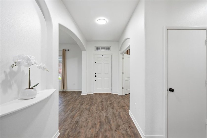 NEWLY renovated four-bedroom,two-bathroom split-plan home with - photo 4