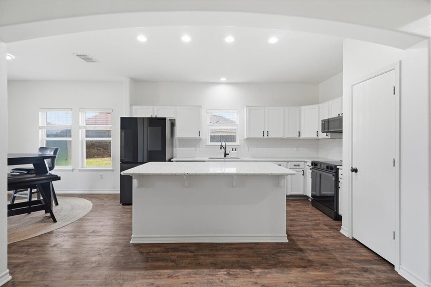 NEWLY renovated four-bedroom,two-bathroom split-plan home with - photo 9
