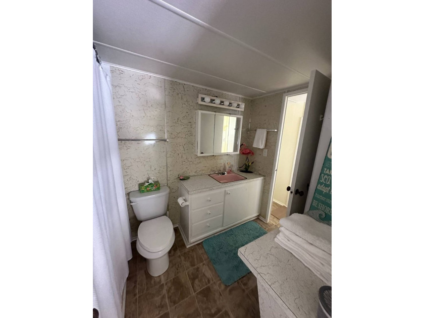 Charming vintage 2-bedroom, 1-bath mobile home located on an - photo 11