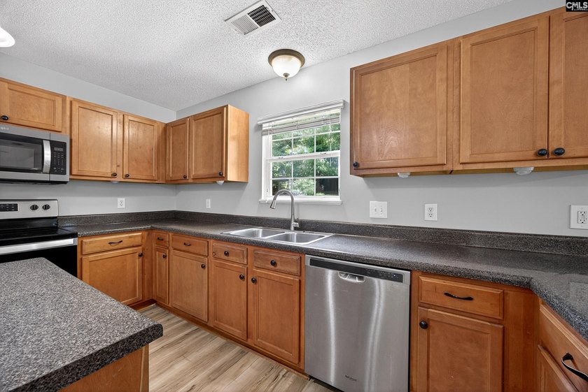 Welcome home to this beautifully updated 4-bedroom, 2.5-bath - photo 12