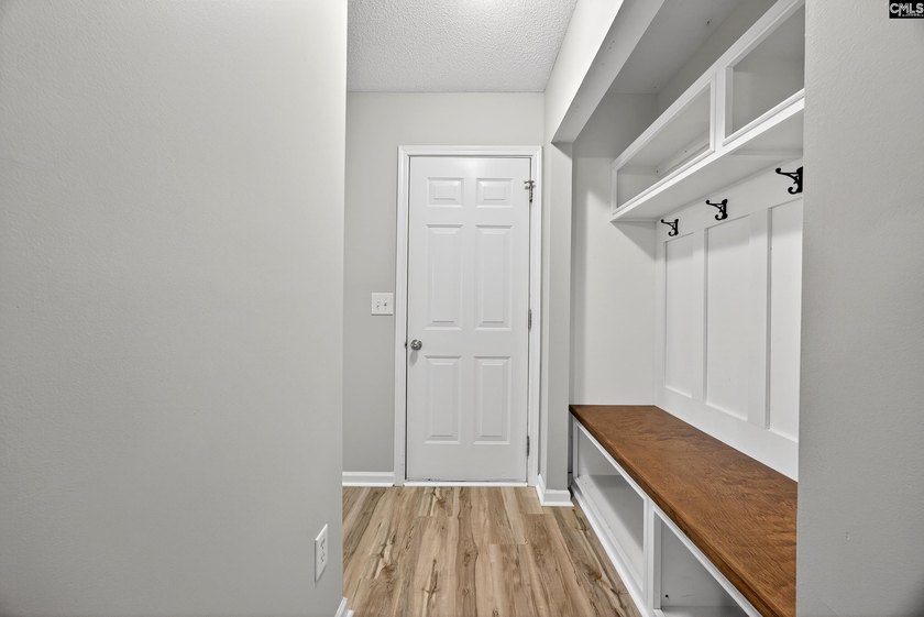 Welcome home to this beautifully updated 4-bedroom, 2.5-bath - photo 17