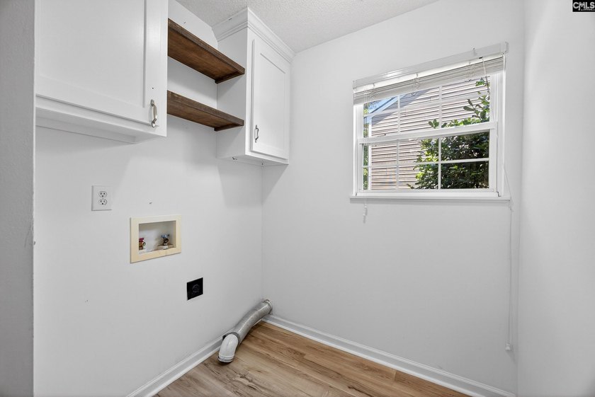 Welcome home to this beautifully updated 4-bedroom, 2.5-bath - photo 19