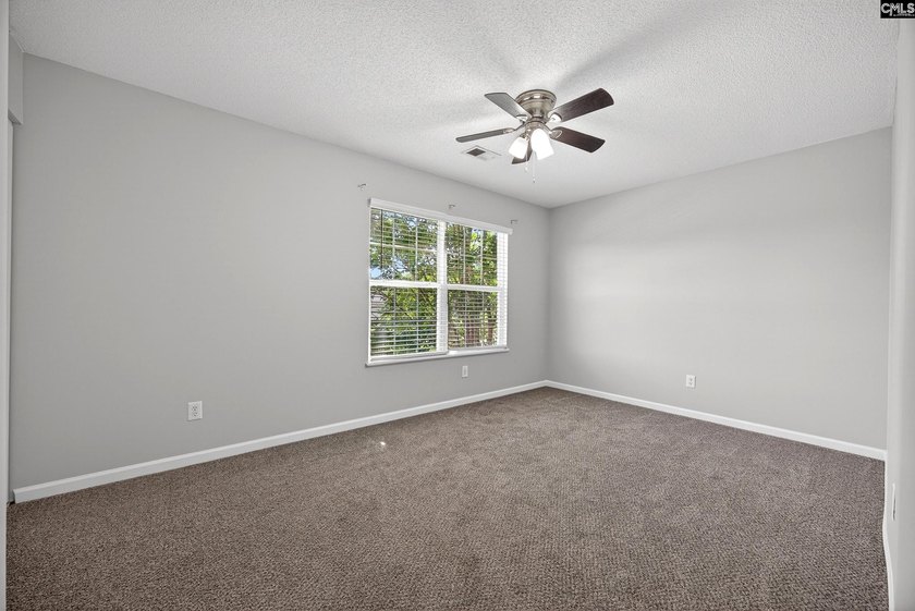 Welcome home to this beautifully updated 4-bedroom, 2.5-bath - photo 30
