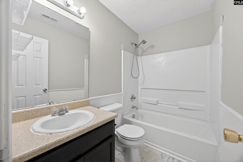 Welcome home to this beautifully updated 4-bedroom, 2.5-bath - photo 36