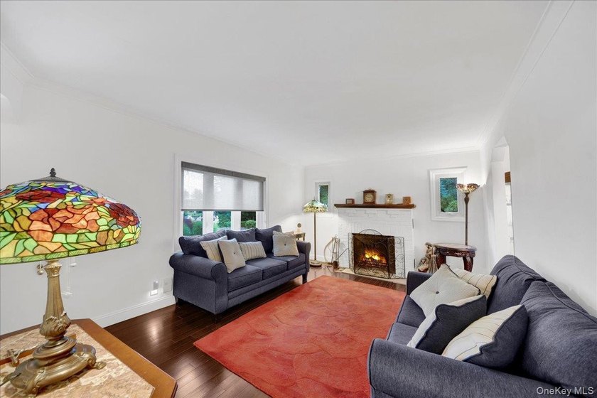 WELCOME HOME!! This charming brick Cape Cod with - photo 13