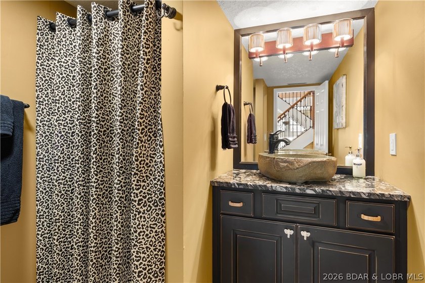 Experience tranquil lakeside living in this luxurious 3BR/3BA - photo 18
