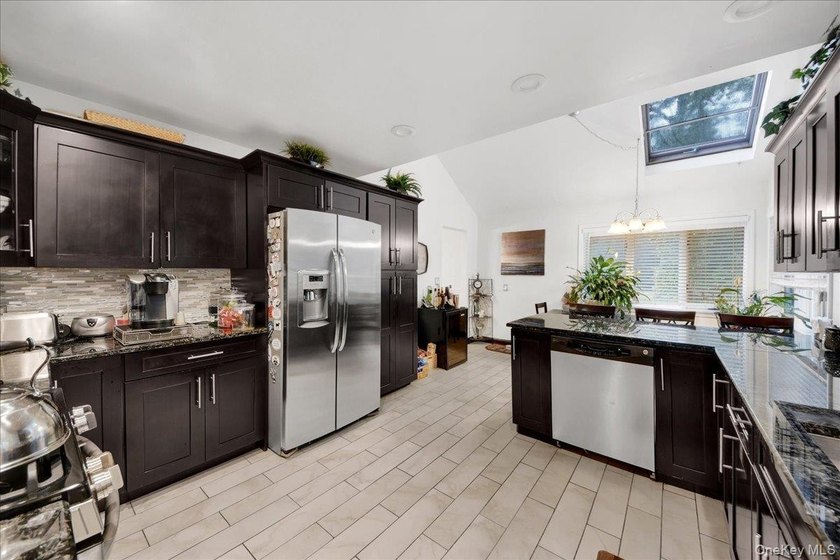 WELCOME HOME!! This charming brick Cape Cod with - photo 20