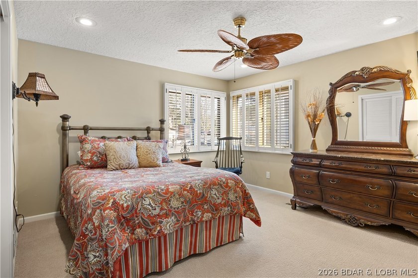 Experience tranquil lakeside living in this luxurious 3BR/3BA - photo 24