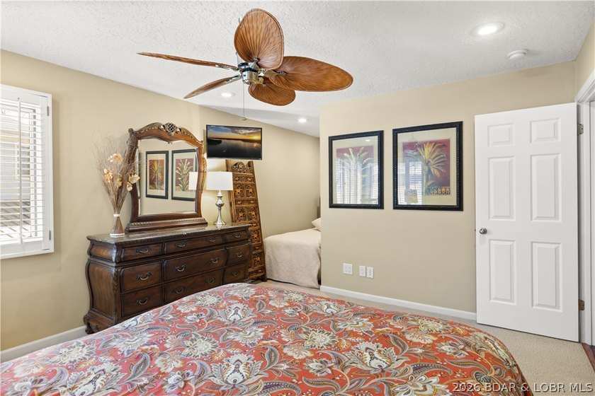 Experience tranquil lakeside living in this luxurious 3BR/3BA - photo 25