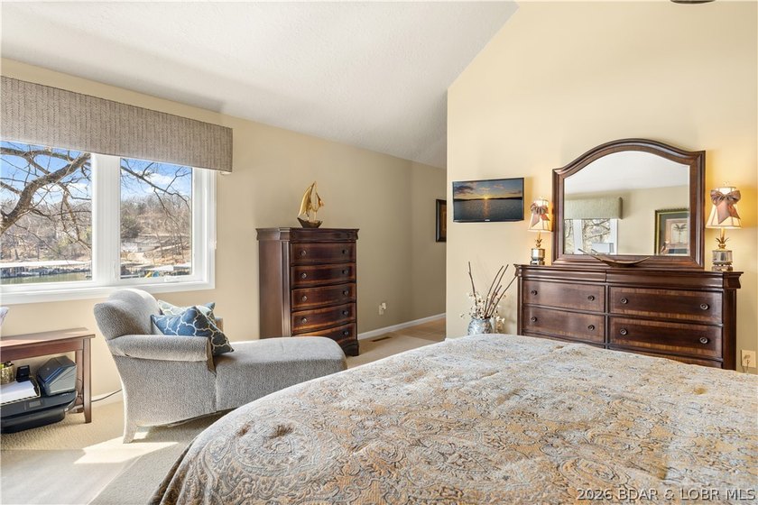 Experience tranquil lakeside living in this luxurious 3BR/3BA - photo 30