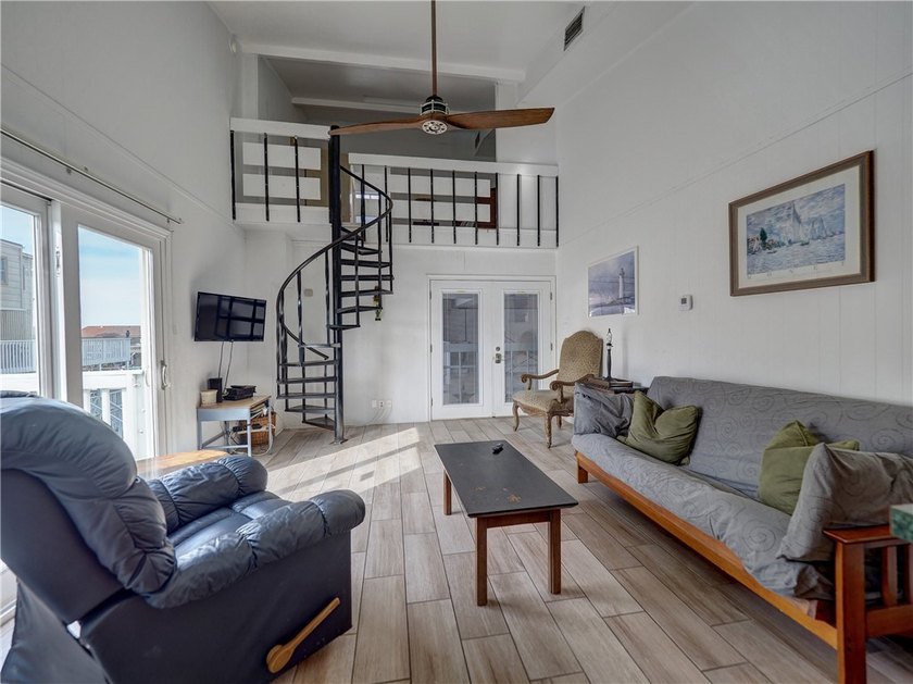 Enjoy relaxing views of the canal from this large unit in the - photo 4