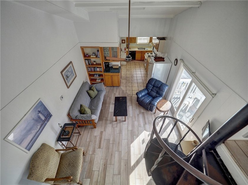 Enjoy relaxing views of the canal from this large unit in the - photo 6