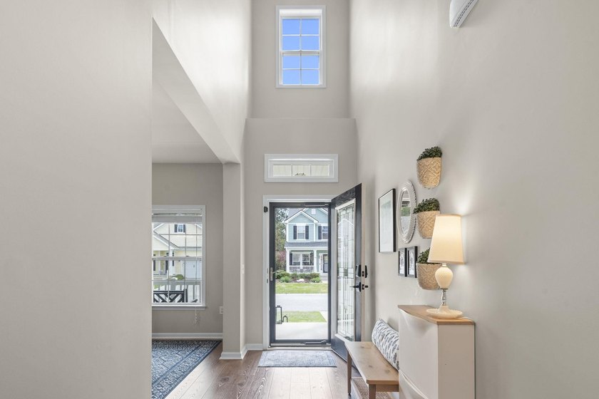 Four-bedroom, two-and-a-half-bathroom home with pond views and a - photo 12