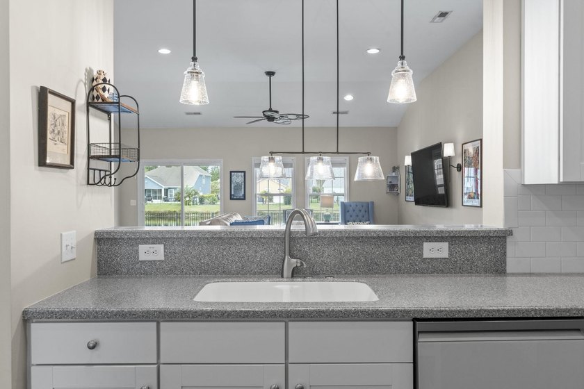 Four-bedroom, two-and-a-half-bathroom home with pond views and a - photo 16