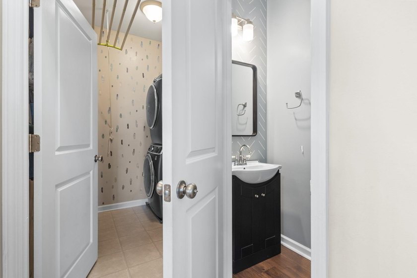 Four-bedroom, two-and-a-half-bathroom home with pond views and a - photo 26