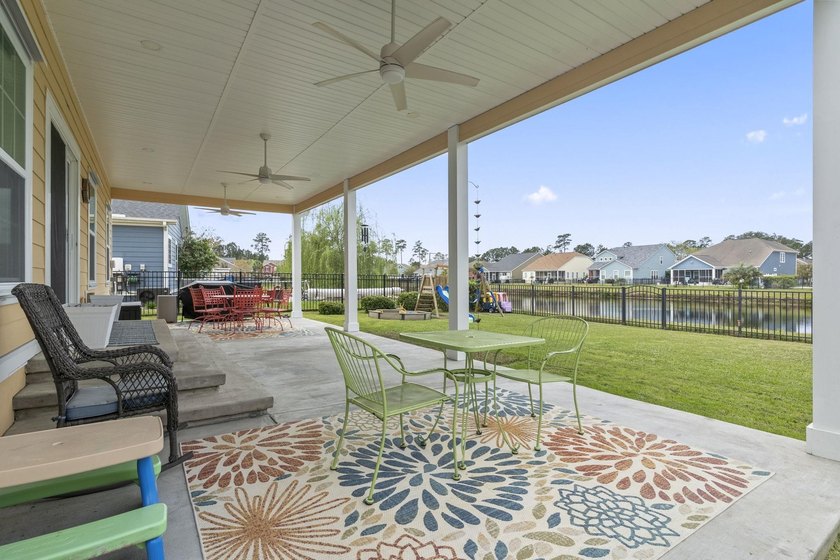 Four-bedroom, two-and-a-half-bathroom home with pond views and a - photo 35