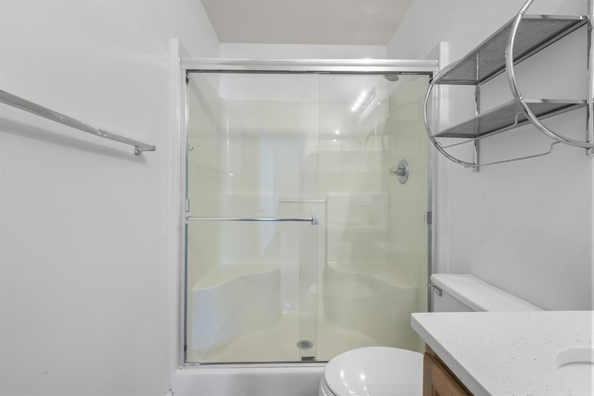MUST SEE! This beautifully updated, single-level END UNIT - photo 13