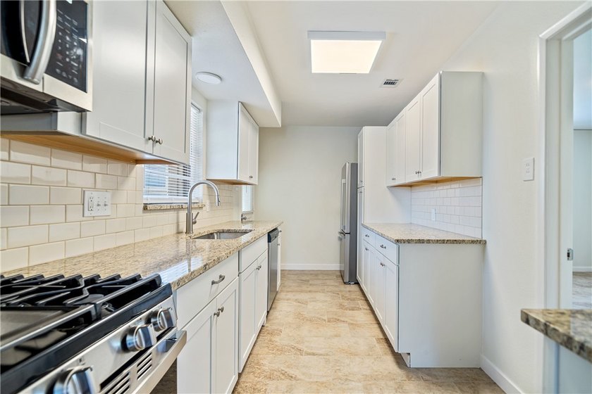 This move-in-ready home has been extensively updated, blending - photo 8