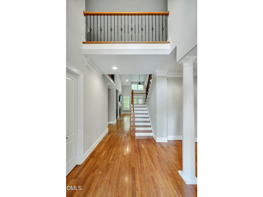Nestled on a private, acre-plus, cul-de-sac homesite within the - photo 5
