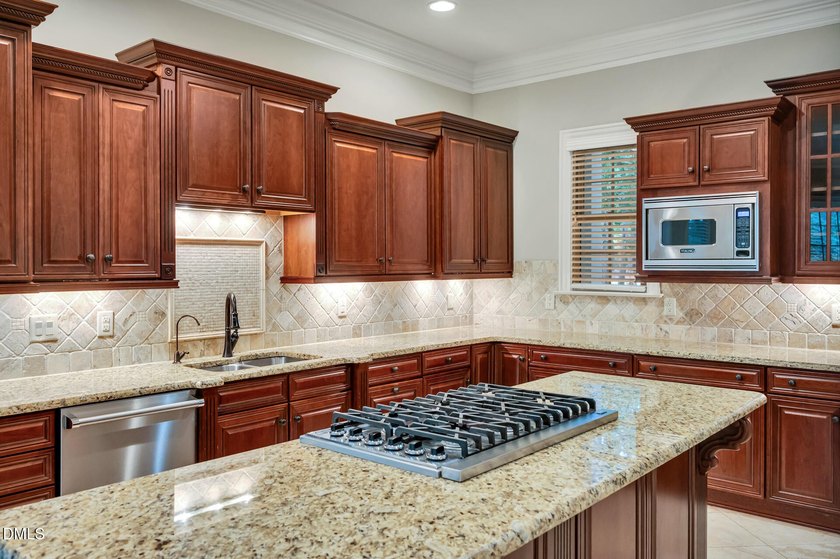 Nestled on a private, acre-plus, cul-de-sac homesite within the - photo 10