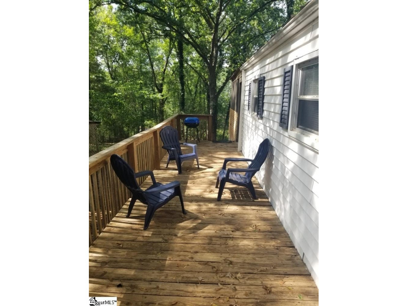 Buying on Lake Hartwell means more than finding a GETAWAY - it's - photo 2