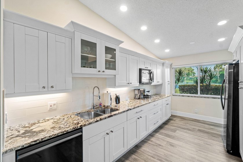 Rarely available &amp; totally remodeled 2-bed, 2-bath END UNIT - photo 12