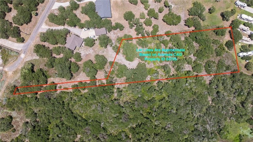 This lot has just under 2 acres of raw land that is located - photo 2