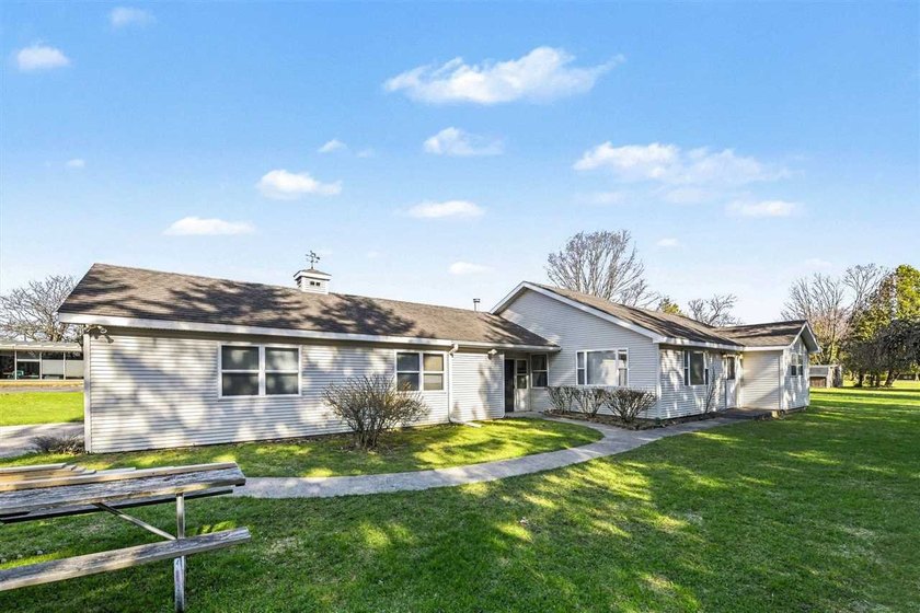 Nestled in a prime location, this charming home sits on an - photo 2